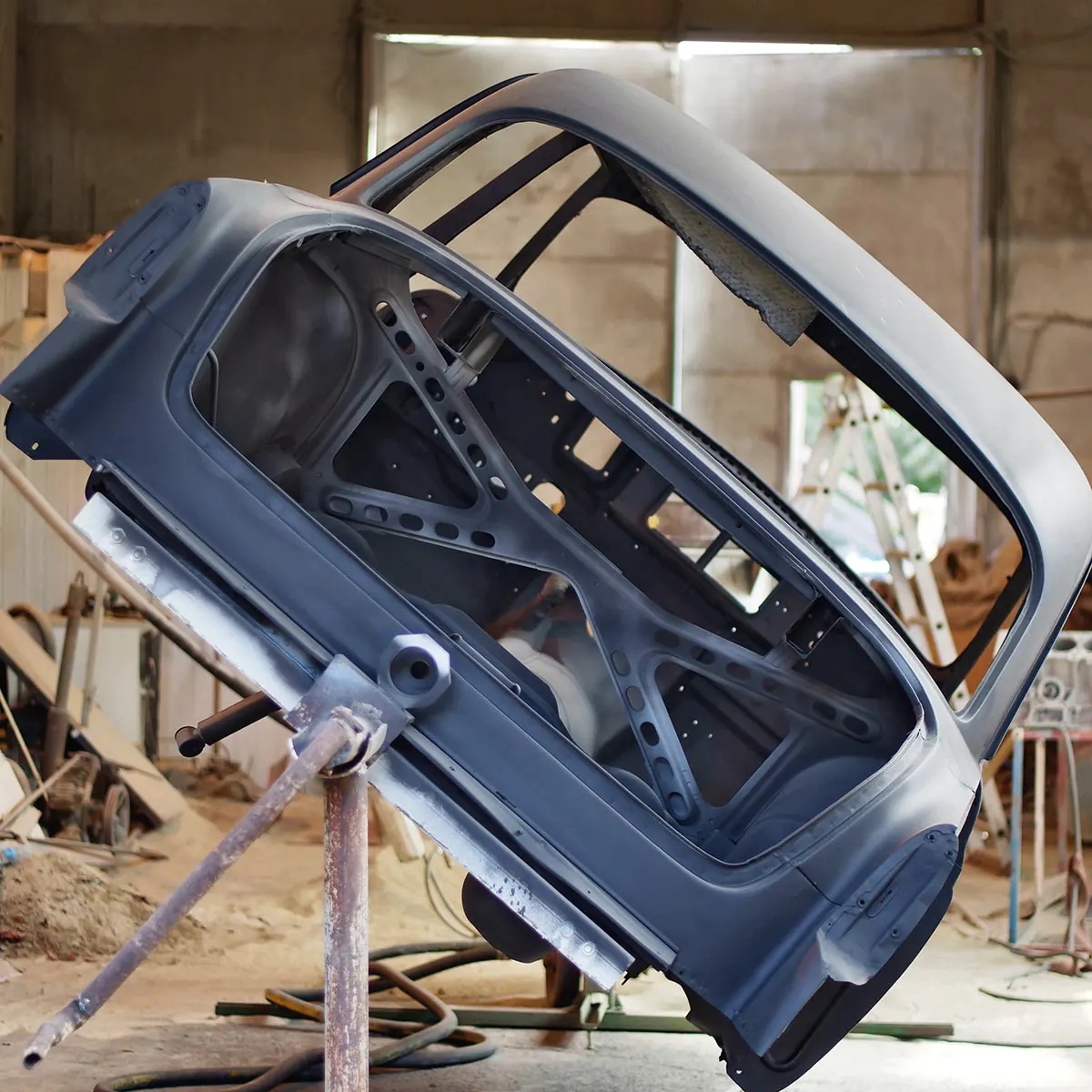 Automotive body panel prepared by sandblasting
